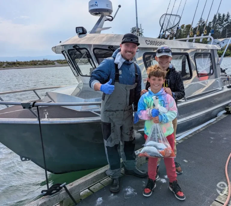 Guests with their catch at the dock